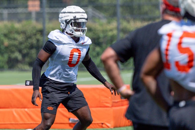 Kobe Hylton (0) runs drills during an Oklahoma State football practice in Stillwater, Okla., on Wednesday, July 31, 2024.