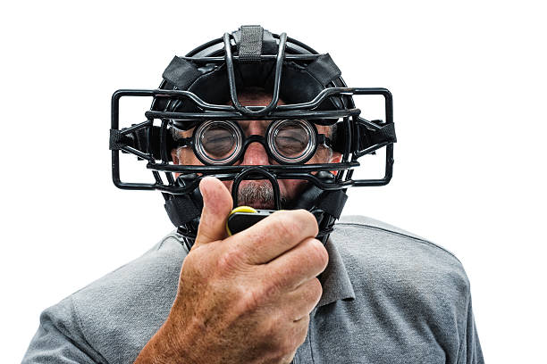 baseball-or-softball-home-plate-umpire-checking-indiactor-picture-id527897734